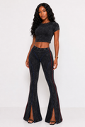 Trendz by She fireworks seam flare pants showing vibrant flame-patterned fabric and wide-leg silhouette on a white background