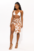 TrendzbyShe Coastal Bloom Split Midi Skirt featuring a flowy, floral design with a high slit and lightweight fabric.