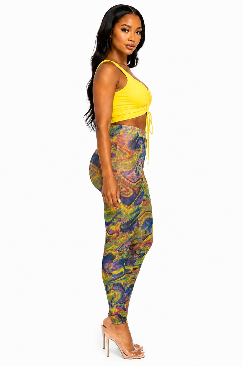 Vivid mesh legging set by TrendzbyShe featuring vibrant mesh fabric and matching leggings for a stylish athleisure look.
