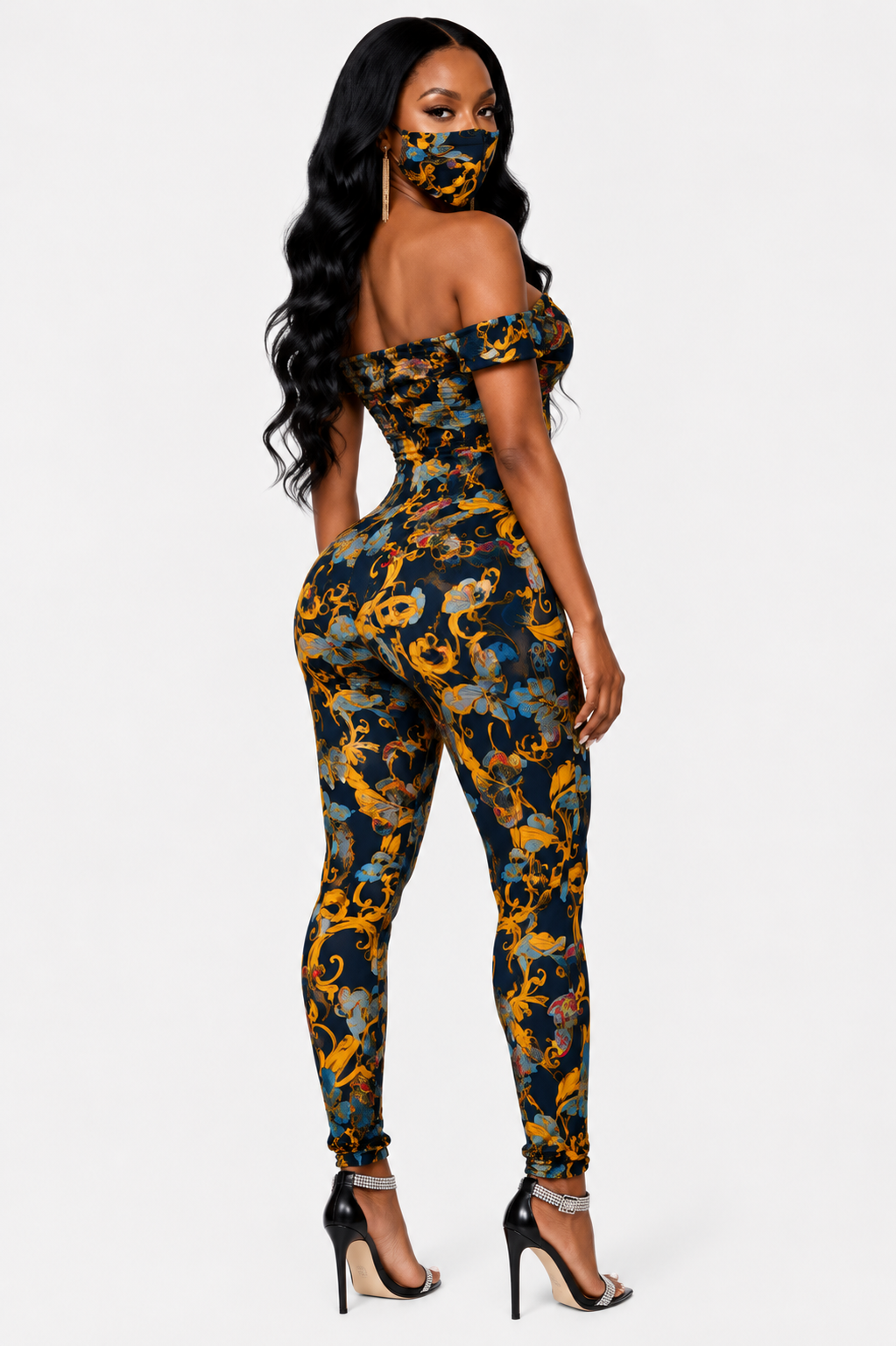 Golden Muse off-shoulder two-piece bodysuit set by TrendzByShe, featuring a stylish matching top and bottom in a vibrant gold color.