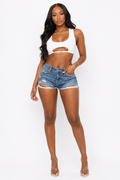 Distressed high-rise denim shorts by TrendzbyShe, featuring frayed hems and a casual fit, displayed on a neutral background.