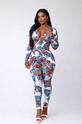 TrendzbyShe Island Muse printed bodysuit and pants set featuring vibrant tropical patterns and comfortable fit.