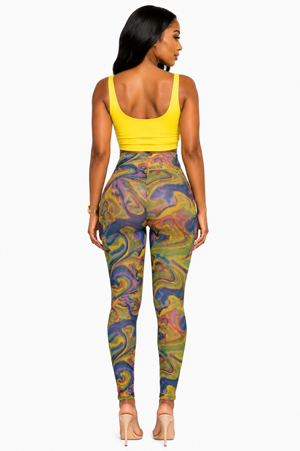 Vivid mesh legging set by TrendzbyShe featuring vibrant, see-through mesh fabric and matching fitted leggings and top.